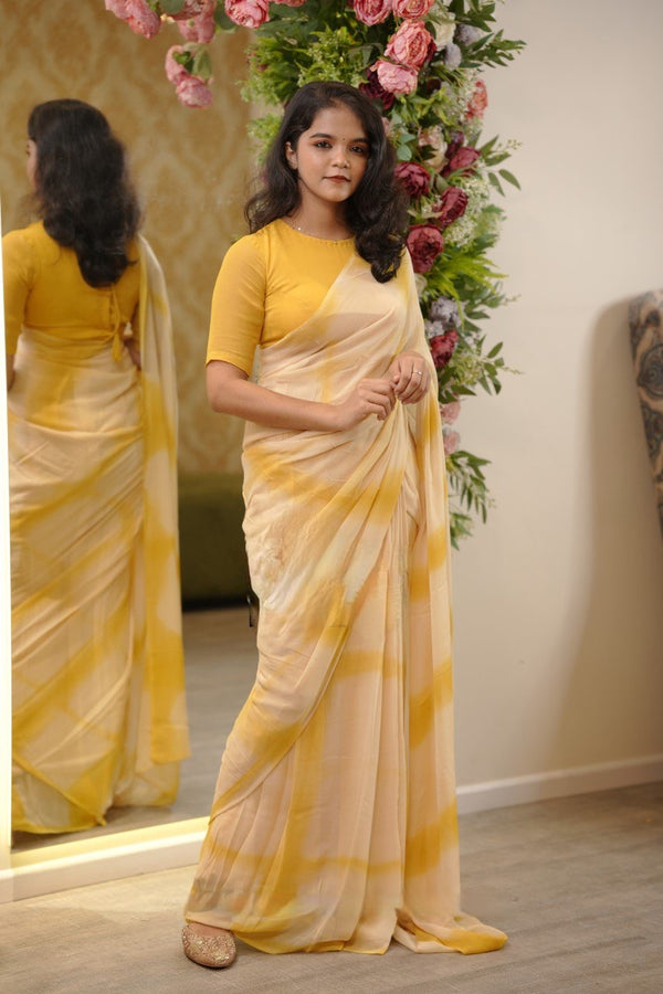 Pure georgette Yellow Shade tie and dye Saree